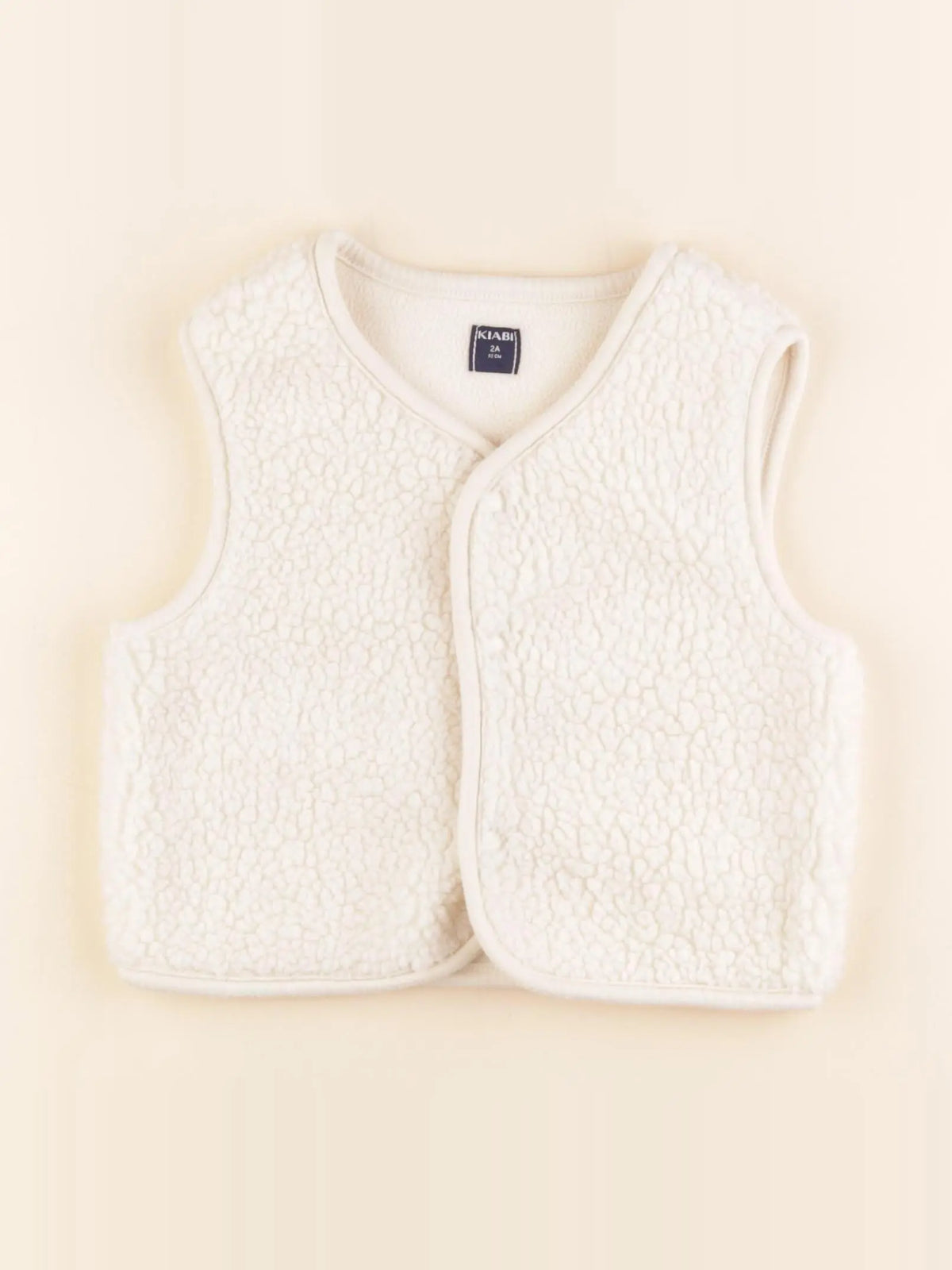 Kiabi - gilet blanc - 2 ans