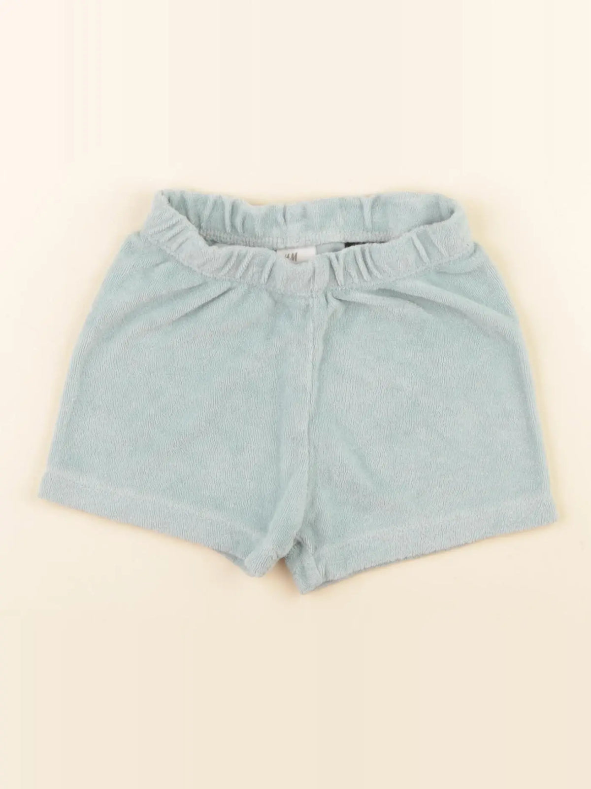 H&M - short vert - 12 mois