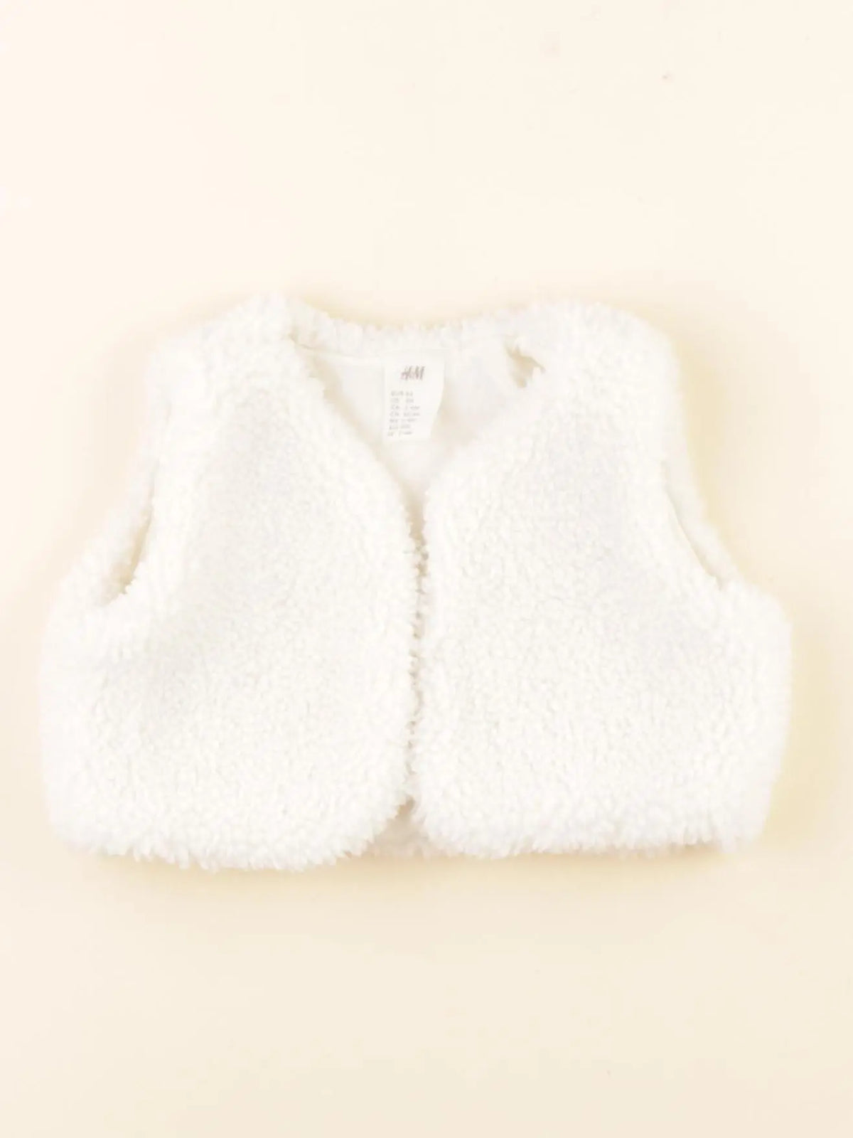H&M - gilet blanc - 2/4 mois