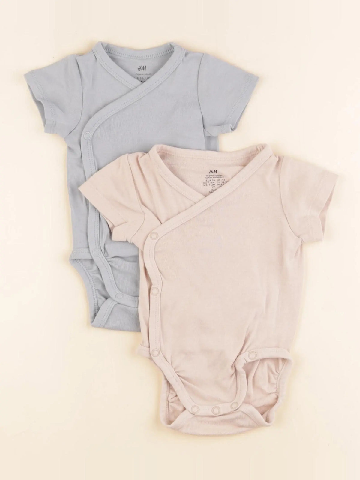 H&M - lot de 2 bodies en coton bleu, rose - 1/2 mois