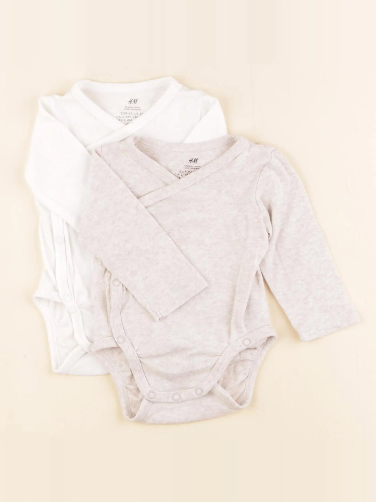 H&M - lot de 2 bodies en coton beige, blanc - 2/4 mois
