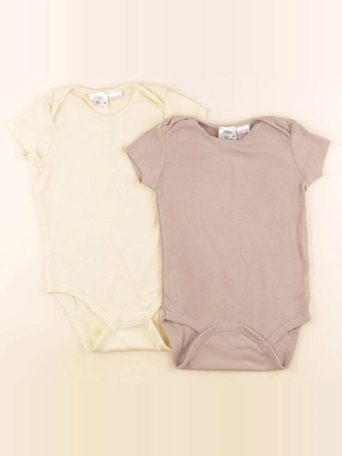 Zara - lot de 2 bodies en coton jaune, marron - 2/3 ans