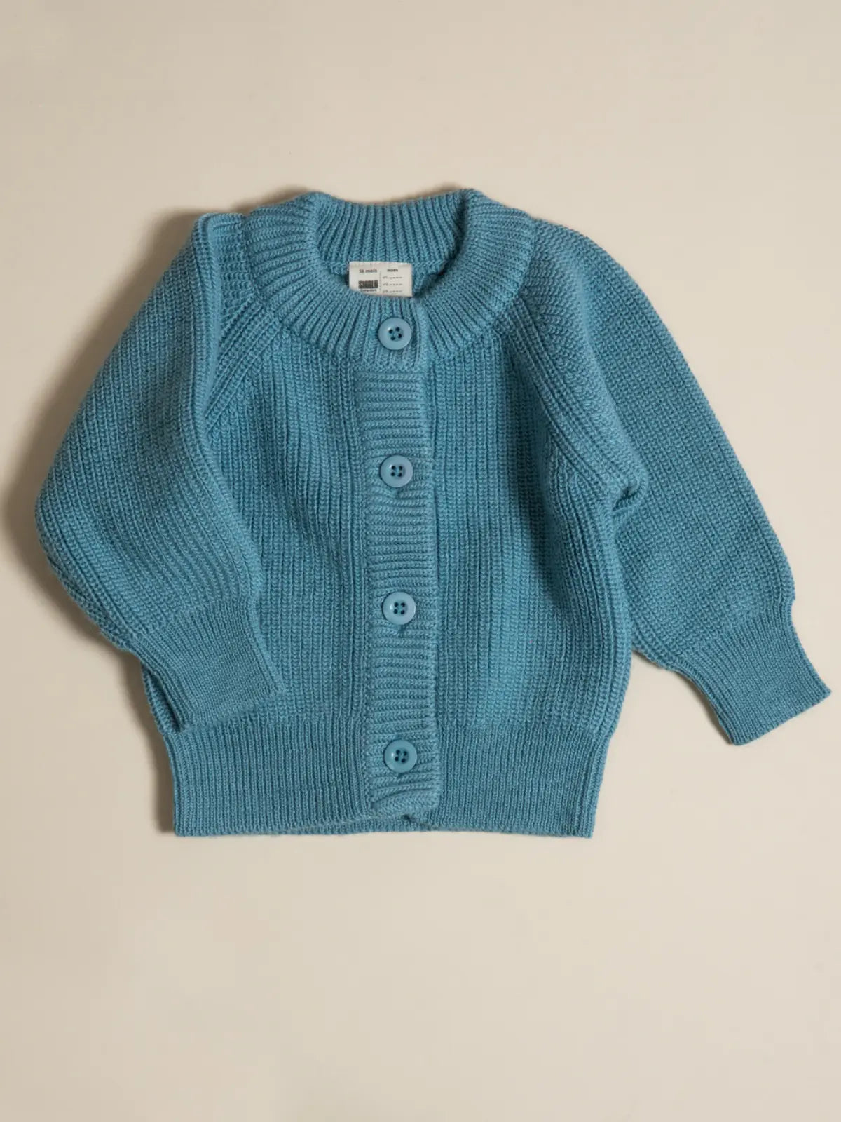 Le gilet bébé 100% laine Bleu vintage