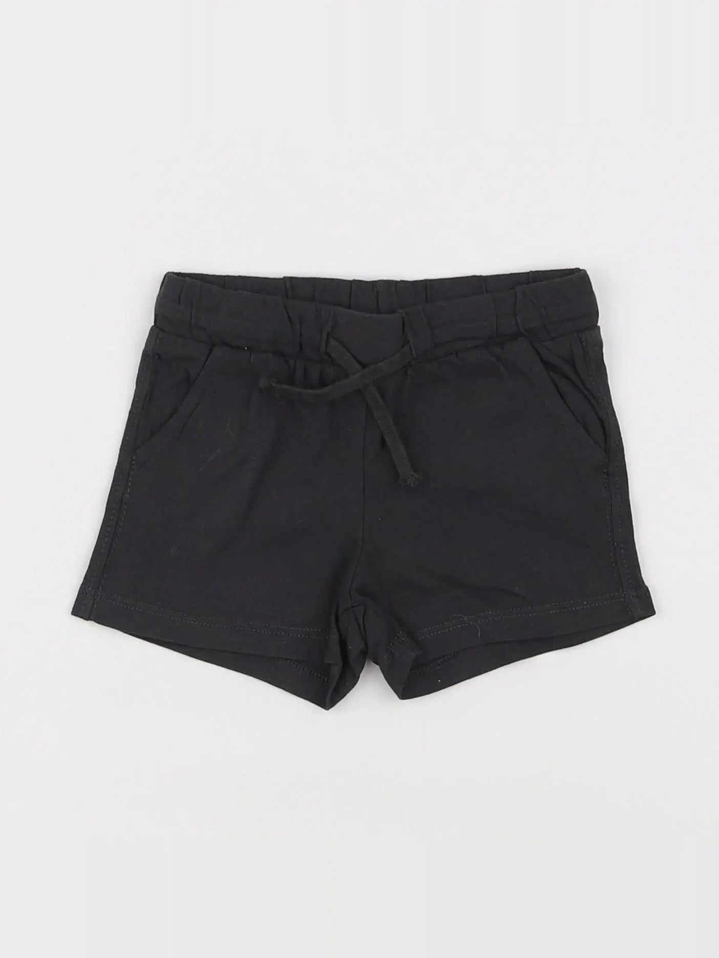 H&M - short noir - 3/6 mois