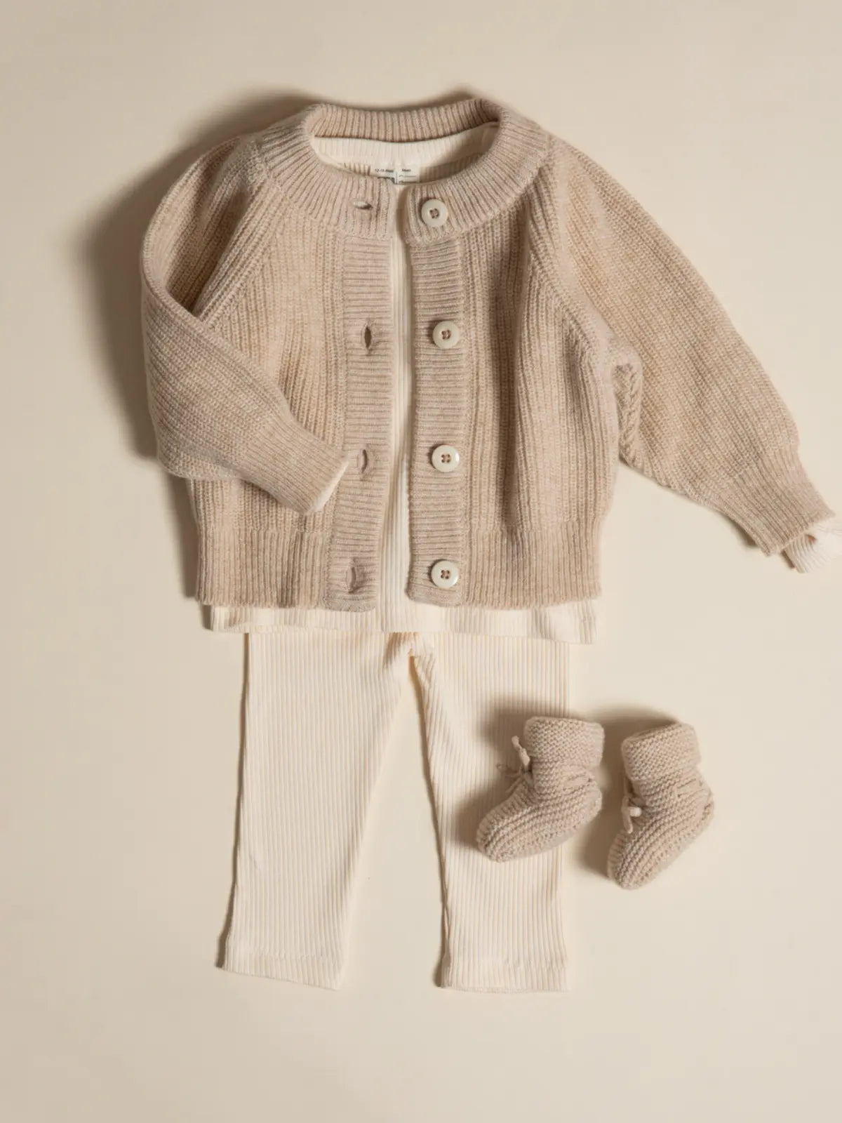 Le gilet bébé 100% laine Beige nougat