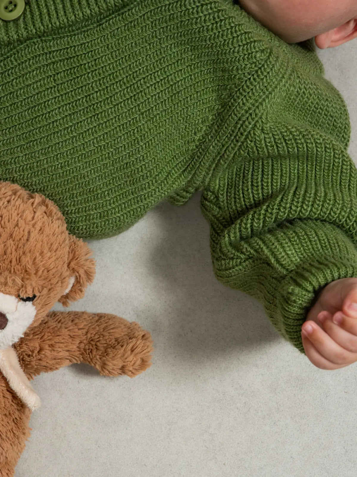 Le gilet bébé 100% laine Vert pistache