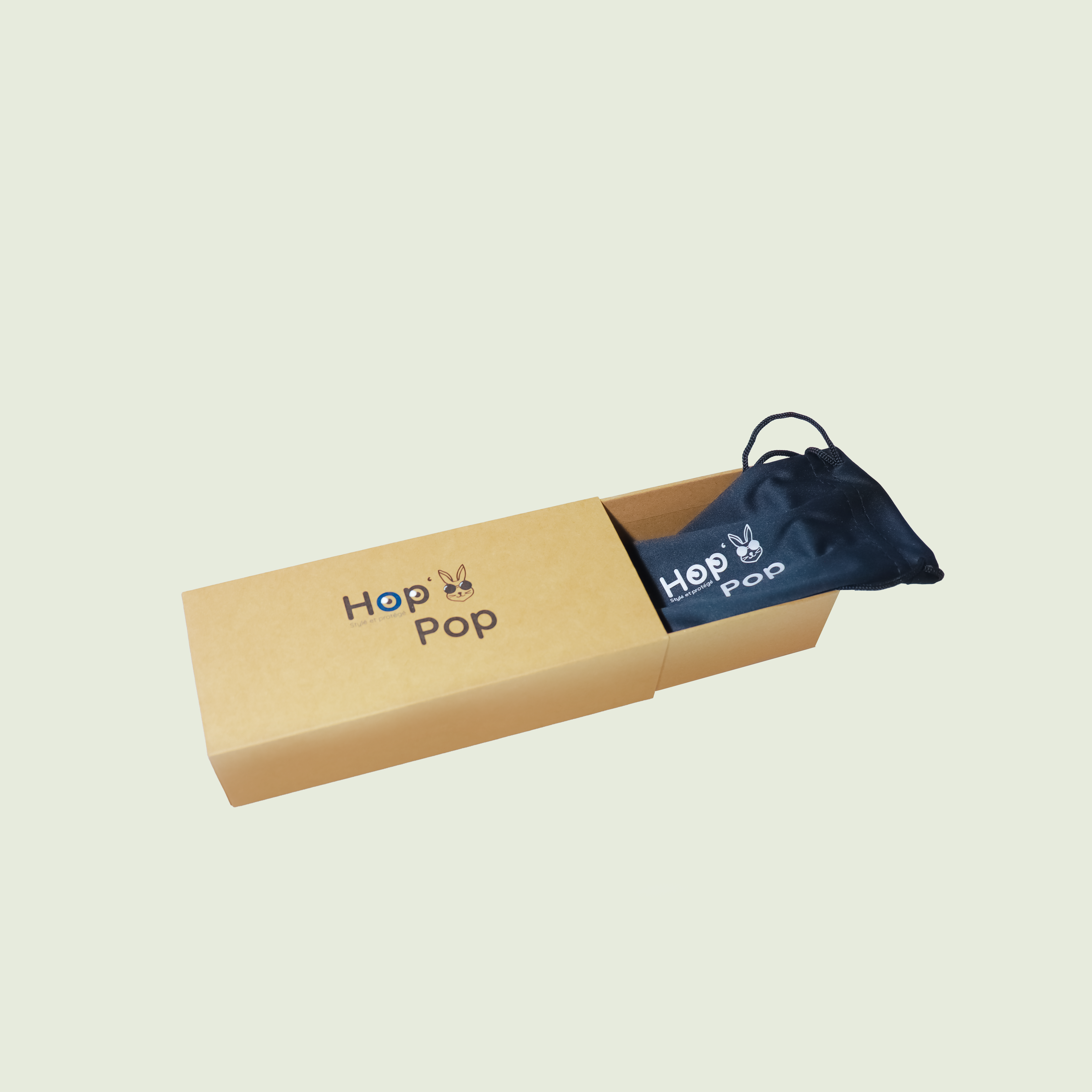 Boîte à lunettes Hop Pop en carton kraft avec pochon en suédine noir à cordon, étui de protection pour lunettes de vue ou de soleil.
