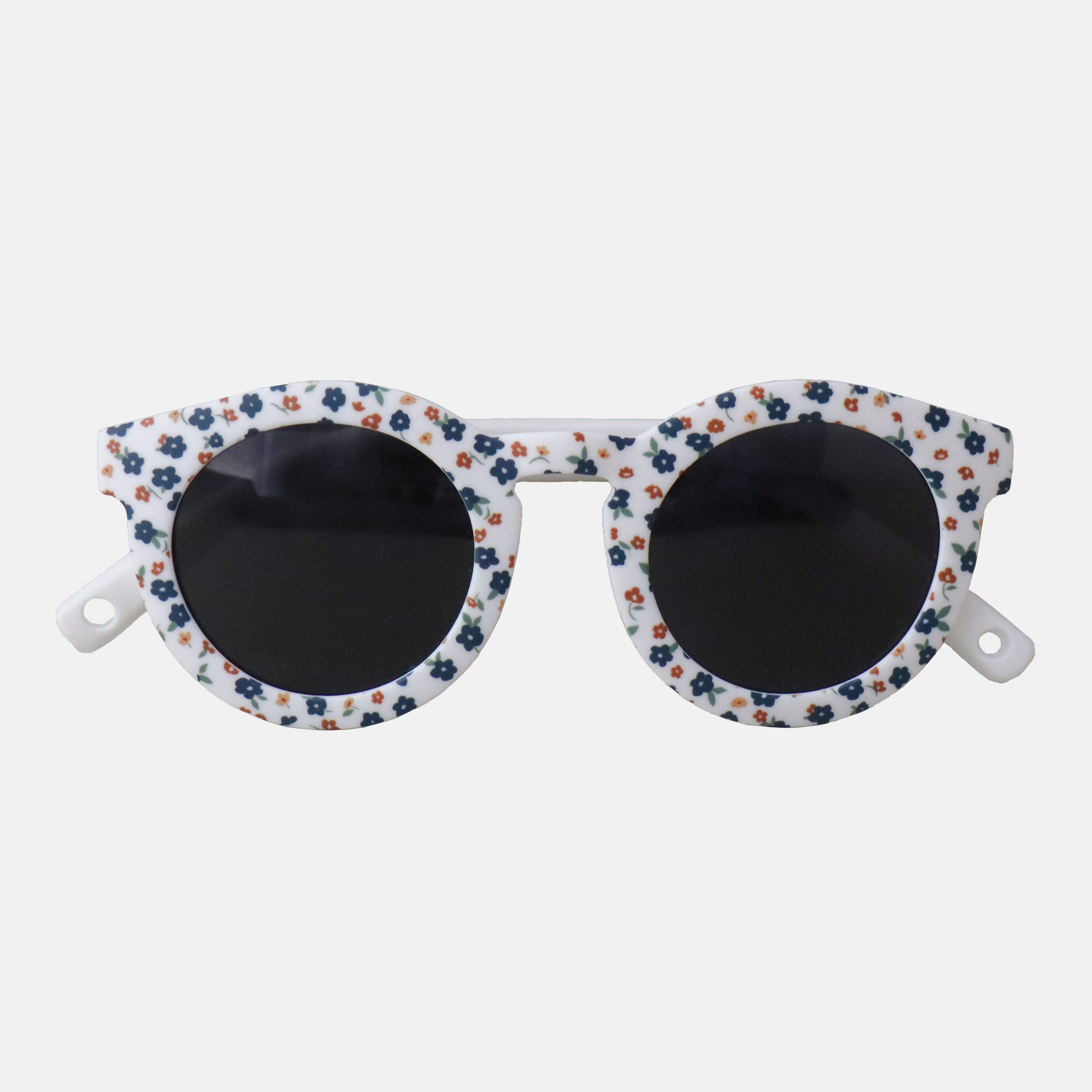Paire de lunettes de soleil bébé catégorie 4, monture en TPEE blanc avec motif liberty fleuri. 