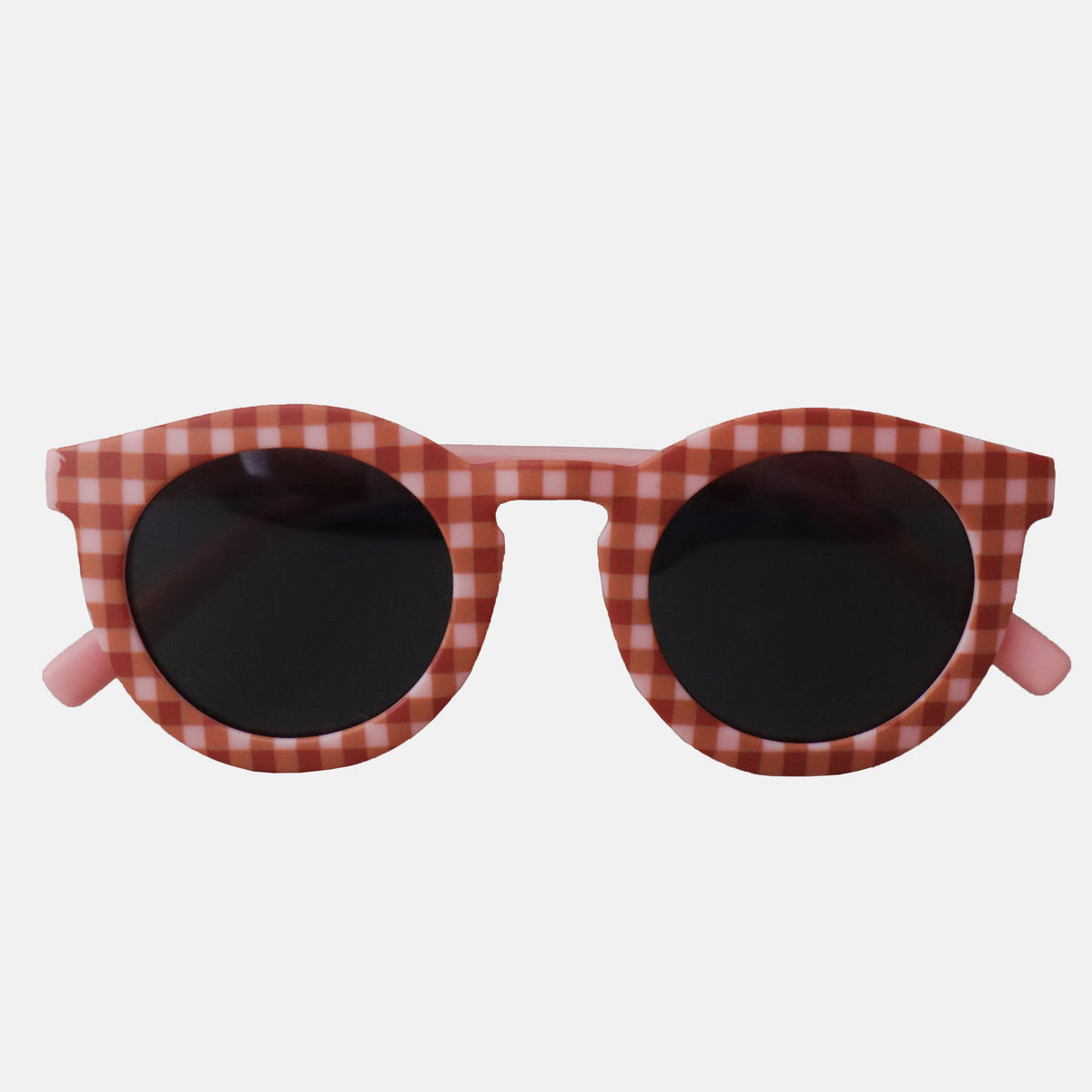 Paire de lunettes de soleil pour enfants catégorie 3, avec monture en TPEE motif Vichy rose et saumon.